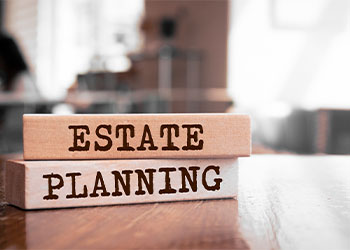 Estate Planning text concept written on wooden blocks